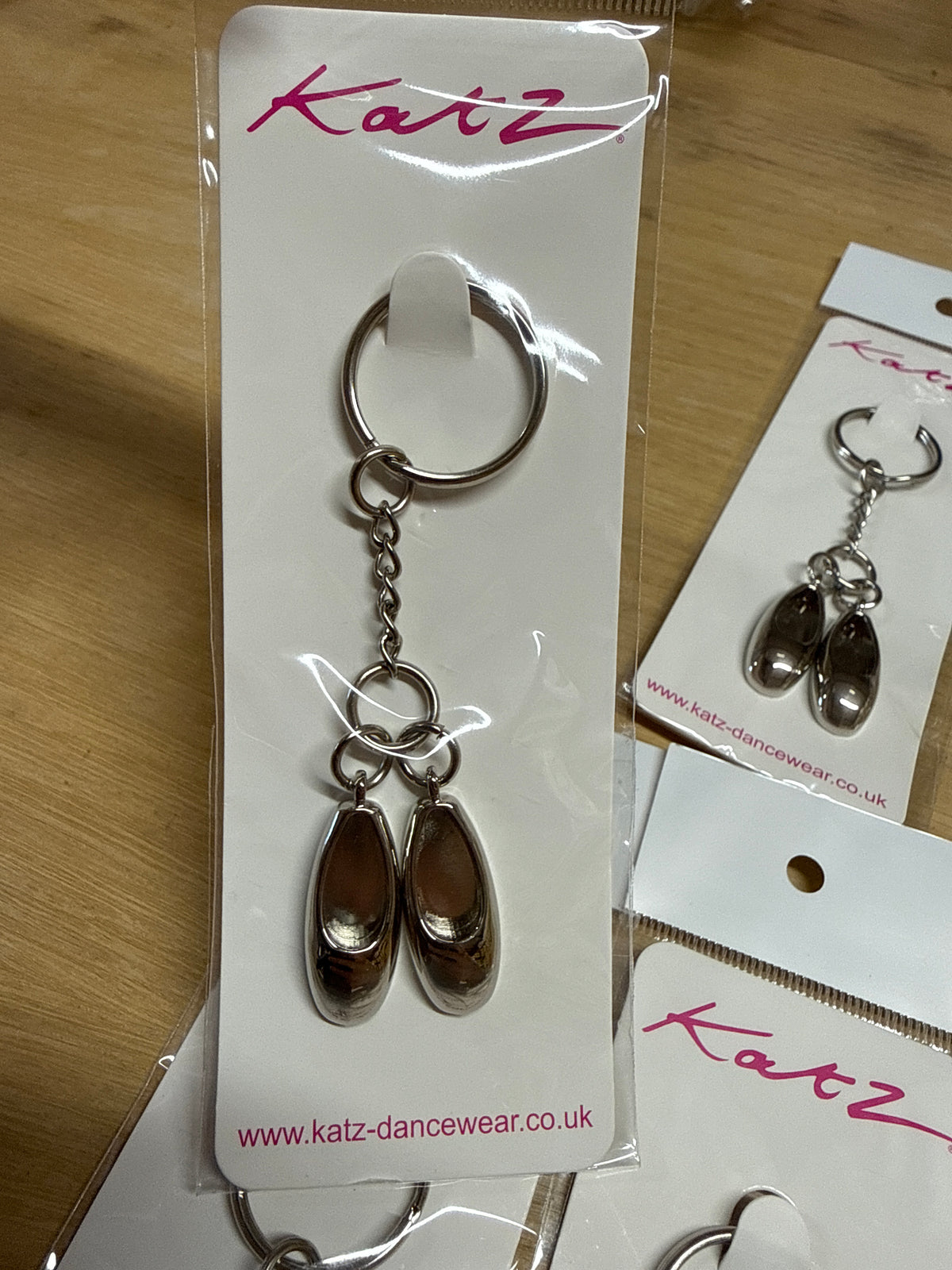 10 x pack of silver double ballet dance shoe keyrings key chains